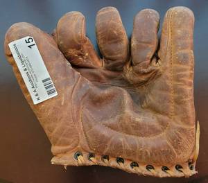 lot 15 image: VINTAGE YOUTH LEATHER BASEBALL GLOVE.