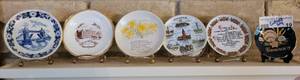 lot 19 image: LOT OF 6 VINTAGE COLLECTIBLE MINI PLATES INCLUDING FROM ENGLAND, ROYAL CROWN DUCHY. SHELF NOT INCLUDED.