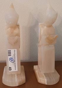 lot 49 image: VINTAGE SOLID CARVED ONYX BOOKENDS. (SOLD 2X THE MONEY)
