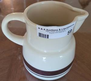 lot 59 image: VINTAGE MCCOY POTTERY STONEWARE PITCHER.