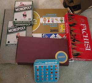 lot 111 image: VINTAGE BOARD GAMES INCLUDING MONOPOLY, SCRABBLE, AND MORE.
