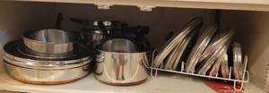 lot 138 image: LOT OF REVERE PANS AND POTS WITH LIDS.