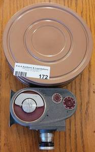 lot 172 image: VINTAGE BELL & HOWELL 8MM 134 CAMERA PLUS METAL MOVIE REEL HOLDERS.