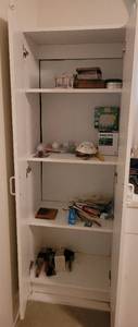 lot 194 image: WHITE 2-DOOR CABINET WITH CONTENTS.