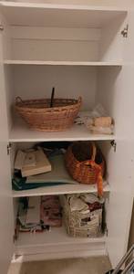 lot 201 image: WHITE 2-DOOR CABINET WITH CONTENTS.