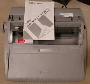 lot 205 image: BROTHER SX-4000 ELECTRONIC TYPEWRITER WITH MANUAL.
