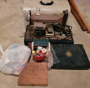 lot 210 image: VINTAGE KENMORE PORTABLE SEWING MACHINE WITH ACCESSORIES  SEWING NOTIONS.