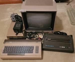 lot 233 image: UNIQUE FIND VINTAGE COMMODORE 64 COMPUTER WITH ACCESSORIES. SEE FULL ITEM DESCRIPTION