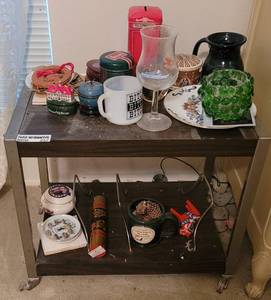 lot 257 image: 2-TIER CART WITH CONTENTS SHOWN.