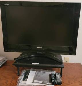 lot 269 image: TOSHIBA REGZA 32 TV MODEL 32LV67U WITH STAND, REMOTE, AND MANUALS.