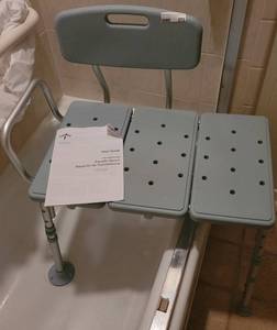 lot 272 image: SHOWER TRANSFER CHAIR WITH MANUAL.