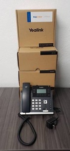 lot 16 image: Lot of 4 Yealink RingCentral IP Phones - Model SIP-T42S