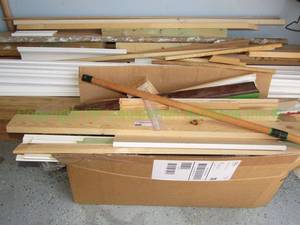 lot 52 image: Assorted wood trim and wood pieces as shown