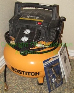 lot 2 image: Bostitch 6 gallon portable air compressor and Kobalt 5 pc quick connect blow gun kit