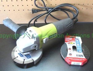 lot 9 image: Ryobi angle grinder model AG4031G, includes grinding & polishing flap disc