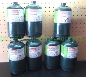 lot 17 image: Coleman 16 oz. propane bottles full
