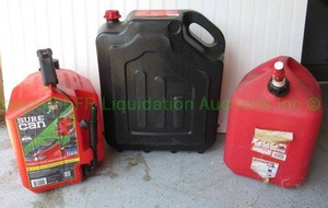 lot 26 image: Sure Can 5 gallon gas can, 5 gallon standard gas can and Super Duty 16 quart drain container (Has approx. 14 fluid full)