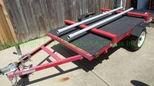 lot 4 image: Haul Master foldable utility trailer, 1195 lb capacity, Great for the kayak in lot 3