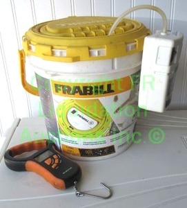 lot 94 image: Frabill aerorated bait bucket and fish scale