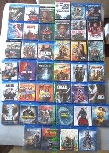 lot 91 image: Assorted Blu-ray and DVD movies as shown