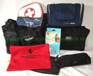 lot 124 image: Assorted tote and travel bags (One with tags attached) including a Tumi, and a Boardwalk Ferrari