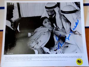 lot 96 image: RARE AUTHENTIC AUTOGRAPH - 1983 Margo Kidder In TRENCHCOAT Press Photo 8x10 - $$$