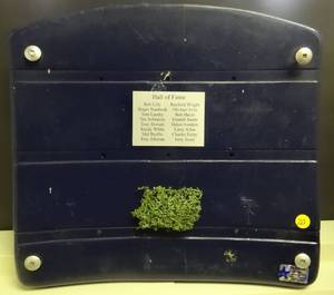 lot 20 image: RARE COLLECTIBLE - THE COWBOY HOUSE - ORIGINAL TEXAS STADIUM SEAT AND GAME USED TURF WITH DALLAS COWBOYS HALL OF FAME PLAQUE - WCOA