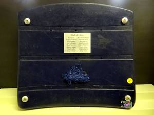 lot 21 image: RARE COLLECTIBLE - THE COWBOY HOUSE - ORIGINAL TEXAS STADIUM SEAT AND GAME USED TURF (BLUE FROM STAR OR EMBLEM) WITH DALLAS COWBOYS HALL OF FAME PLAQUE - WCOA