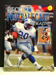 lot 33 image: VINTAGE 1990 BECKETT FOOTBALL CARD MAGAZINE FEATURING SUPERSTAR BARRY SANDERS ON COVER