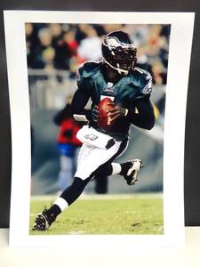 lot 149 image: PHILADELPHIA EAGLES - MICHAEL VICK 8 X 10 PHOTO READY TO FRAME