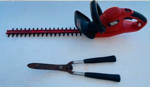 lot 19 image: Black and Decker 20 Hedge Trimmer and Handheld Trimmer