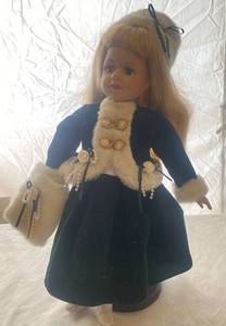lot 27 image: Doll on a Stand