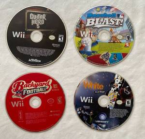lot 37 image: Wii Games - Guitar Hero 5, Baseball Blast, Backyard Football and White World Stage