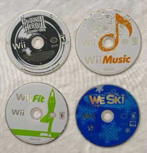 lot 39 image: Wii Games - Guitar Hero III, Wii Music, Wii Fit and Wii Ski