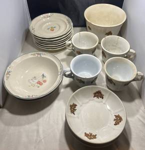 lot 66 image: International Tablework China Marmalade Pattern 7 Saucers and 2 bowls.1 Large bowl and 4 cups with a P Marking.