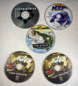 lot 85 image: 2 Air Hogs RC Flight Simulator, 3rd Strike CD, MXP Most Xtreme Primate DVD, Bass Pro Shops The Strike Game