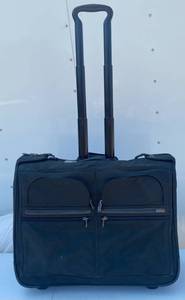lot 98 image: Tumi Luggage