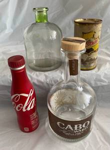 lot 112 image: Cabo Wabo Tequila Bottle, Vintage Can of Falstaff, and aluminum 8.5oz Coca Cola Bottle