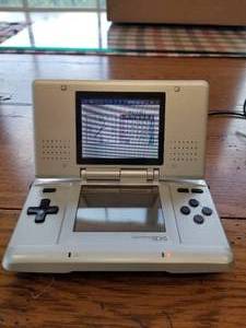lot 43 image: Nintendo DS game console