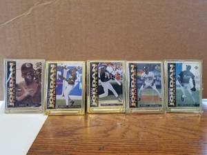 lot 16 image: Michael Jordan Upper Deck embossed metal collector cards