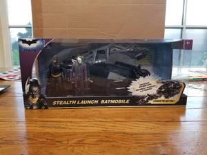 lot 148 image: Stealth Launch Batmobile with Batman and joker figures