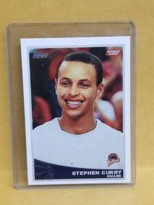 lot 18 image: Stephen Curry topps rookie card - Authenticity unknown