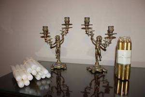 lot 9 image: Pair of Brass Candleabras with White and Gold Candles
