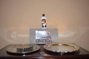 lot 21 image: Silver Platters by Oneida, Trivets, Oneida 14 Roll Tray and Weiman Silver Polish