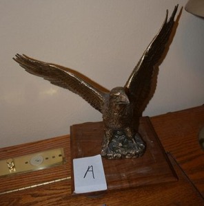 lot 35 image: Metal Eagle Figurine on Wooden Block