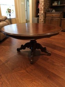 lot 24 image: Vintage Wooden 44 Round Coffee Table, Stands 21 Tall, Pedestal is Hand-carved with 4 Scrolled Legs