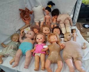 lot 629 image: Dolls in need of TLC and doll parts