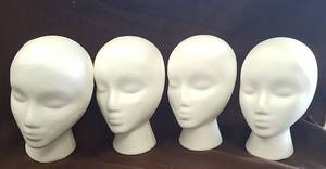 lot 771 image: 4 wig heads