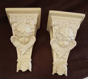 lot 829 image: Cherub Drapery Curtain Rod Sconce Holders
