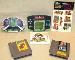 lot 9 image: Nintendo Super Mario 3 & Duck Hunt game cartridges, Sims 3 pets Nintendo 3DS game chip, and more